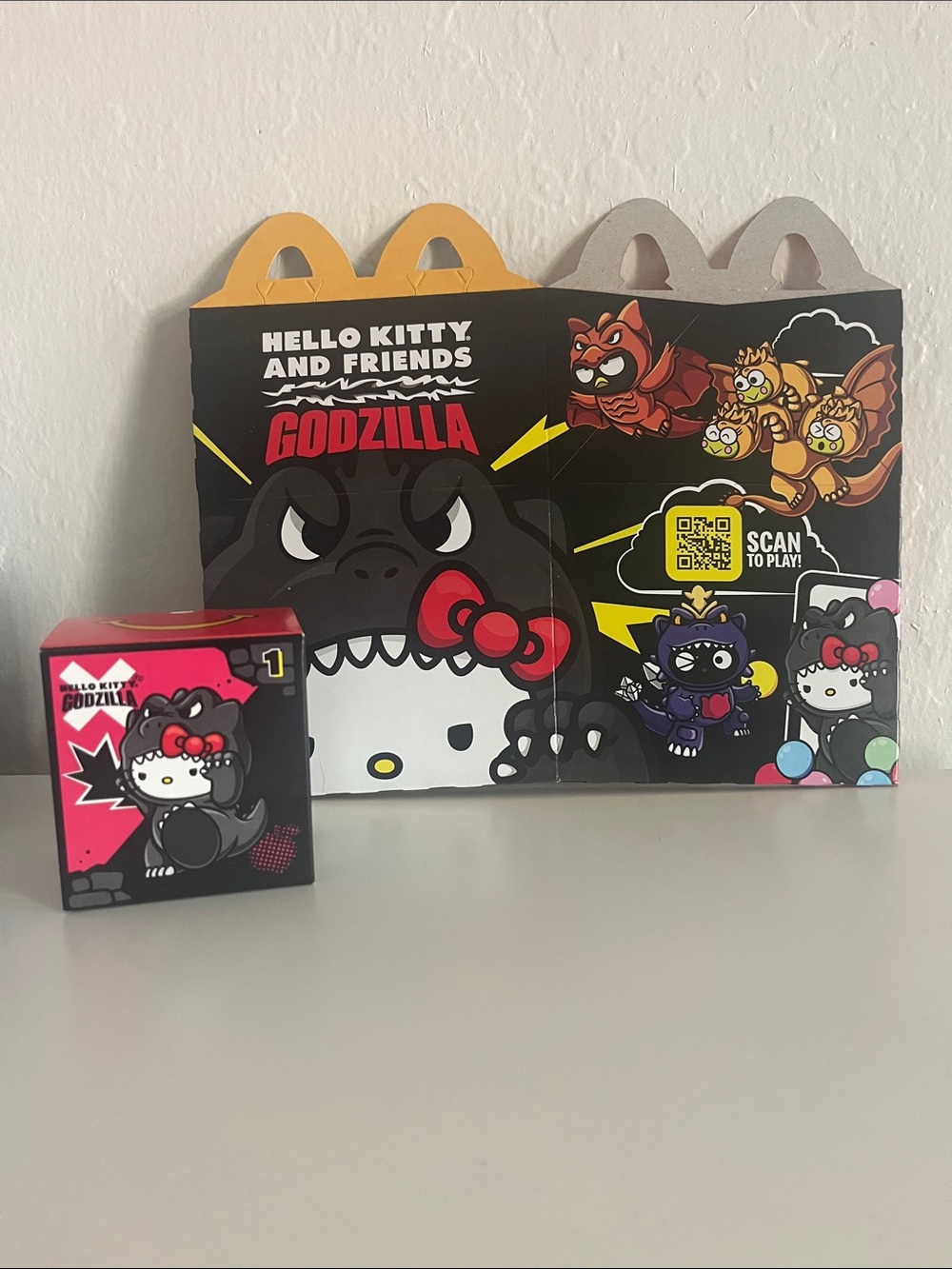 Hello Kitty Godzilla Collectible Toy Pack - Black, Pink, Yellow